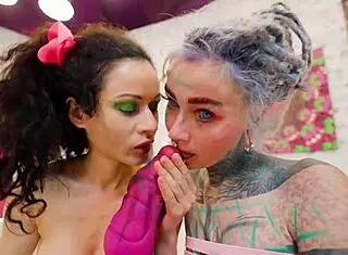 Fisting her tattooed slut's asshole.