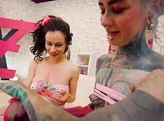 Fisting her tattooed slut's asshole.