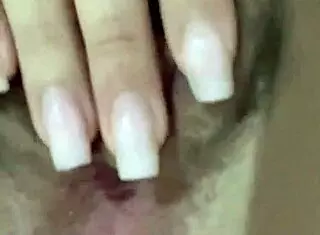 she's got a hairy trimmed pussy hungry for cock while masturbating solo