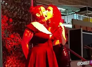 spanish fat woman on stage receives wax treatment