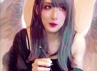 Beautiful Japanese ladyboy masturbates while streaming live video