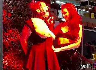 spanish fat woman on stage receives wax treatment