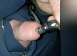 Jayq Undergoes Intense Sounding with Steel Plug in Penis