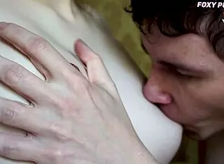 close-up on big tits getting licked and nipple played