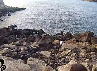 Rough Fuck Doll Moans During Web Chat, Gets Cum In Mouth On Cliff By The Sea