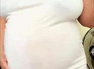 Pregnant Arab beauty flaunts big belly and milky boobs