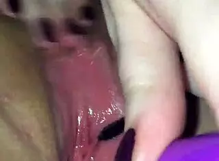 Hey, check out this wet wife masturbating with her lesbian friend