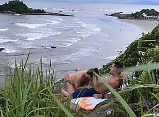 Couple Caught On Beach