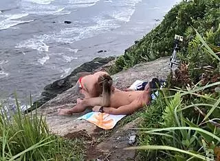 Couple Caught On Beach
