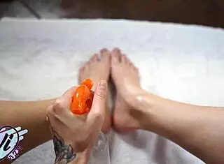 Brunette Shows Oiled Feet Close Up