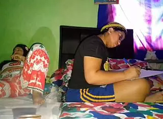 Hey, I’m stroking my huge coño while my stepsister does university homework!