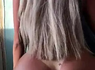 Transsexual model in crossdressing shows off her buttocks