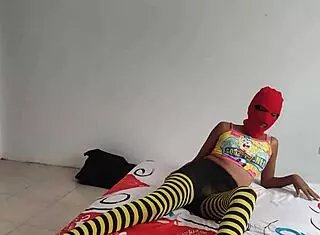 Stepmother caresses her buttocks and tits then the stepson arrives and rubs his penis with her feet