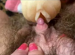 A closeup view of a big clit orgasm scene