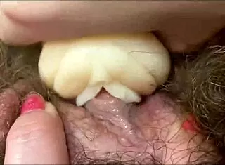 A closeup view of a big clit orgasm scene