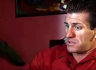 Blonde Mom Bent Over on the Bed. Relaxing After a Long Day.