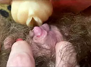 A closeup view of a big clit orgasm scene