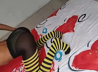 Stepmother caresses her buttocks and tits then the stepson arrives and rubs his penis with her feet