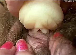 A closeup view of a big clit orgasm scene