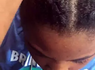 Ebony teen sucks cock in the pouring rain