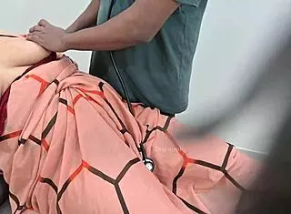 indian doctor asks, how are you feeling today, lady patient?