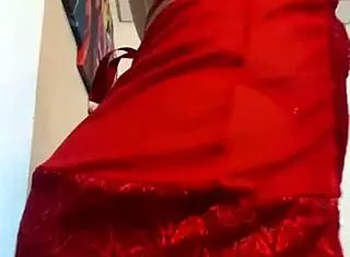 Curly haired beauty strips panties and twerks in red lingerie.