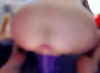 Lilrosiedoll explores large toys in a playful session