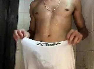 Amateur handjob in shower scene