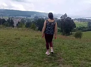 Pretty shaved pussy in leggings gets touched outdoors