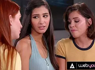 Lesbians tease straight friend with scissoring