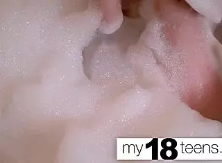 Babe feels intense pleasure masturbating in bath to orgasm closeup.