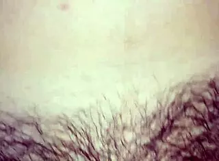 He fucks her fat hairy pussy doggystyle while she's bent over