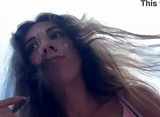 cute girl enjoys burger in public cafe