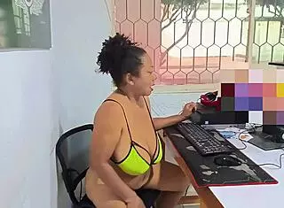 Busty mature woman masturbates in the office during break