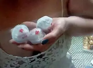 Ginger paris boldly masturbates with chocolates in lingerie.