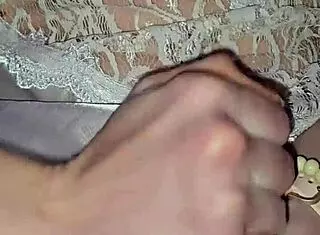 Milf in lingerie jerks cock, licks every drop from cunt