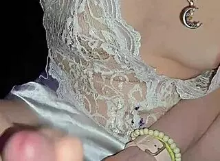 Milf in lingerie jerks cock, licks every drop from cunt