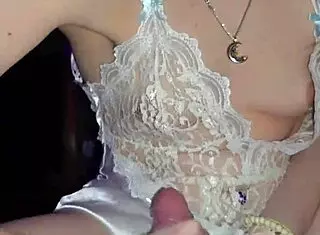 Milf in lingerie jerks cock, licks every drop from cunt