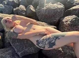 Hot exhibitionist FLASHES her BIG TITS and PLAYS with her CLIT on a public beach.