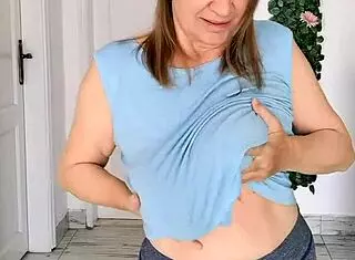 busty braless gilf mariaolds does sporty groove strip dancing in style.