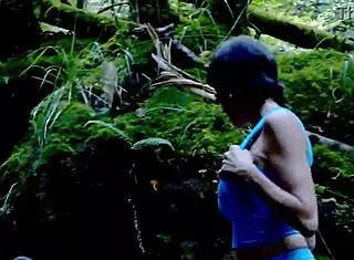 Wild threesome unfolds in forest with sneaky voyeur watching.