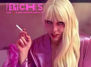 Hot blonde casually smoking a cigarette in fetish scene