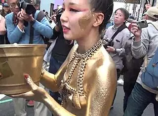 costume slips at gold powder show, nipples exposed