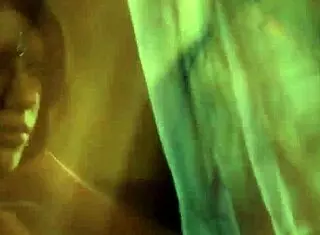 She enjoys the seduction as clothes get ripped during the striptease