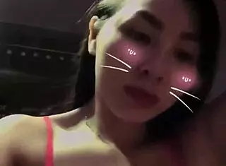 Massaging big tits with two hands