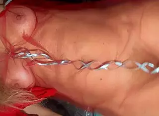 Mature lady masturbates wet hairy pussy on Christmas