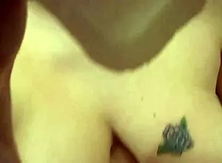 Titty Italian slut fingers herself with dildo while glued to porn screen