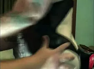 black couple uses crotchless blindfold and handcuffs for fun