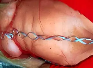 Mature lady masturbates wet hairy pussy on Christmas