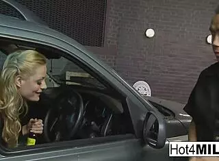 Busty blonde in lingerie and stockings bribes the parking police with sex